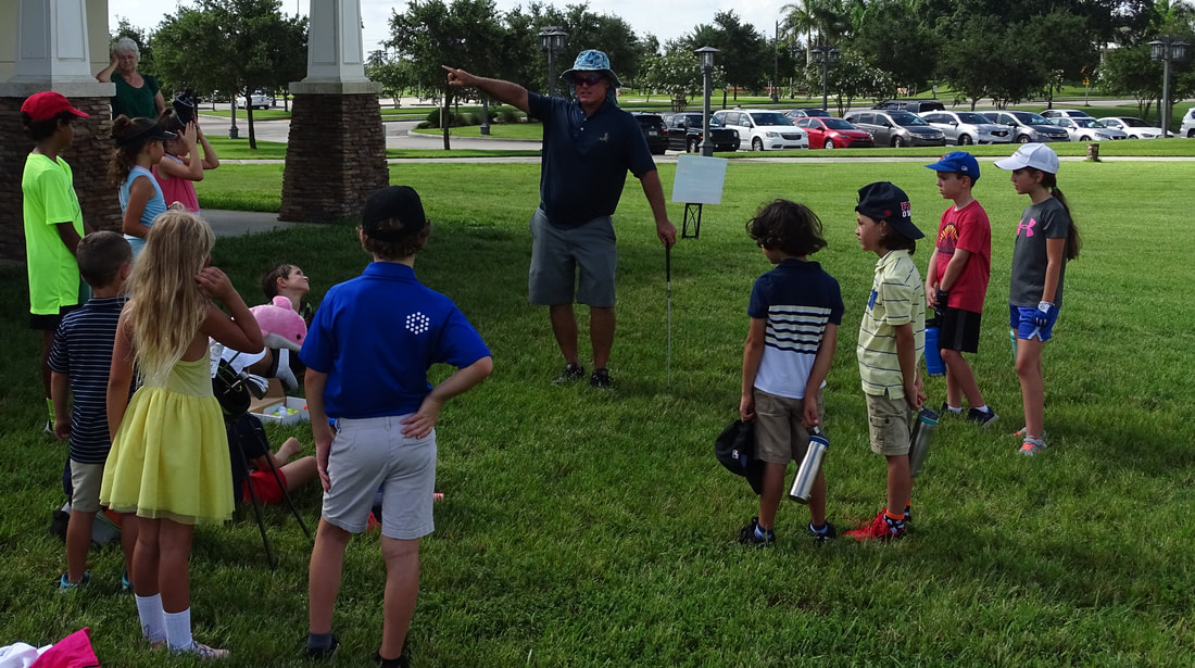 Coach Glen Beaver teaching First Tee Nine Core Values of Golf