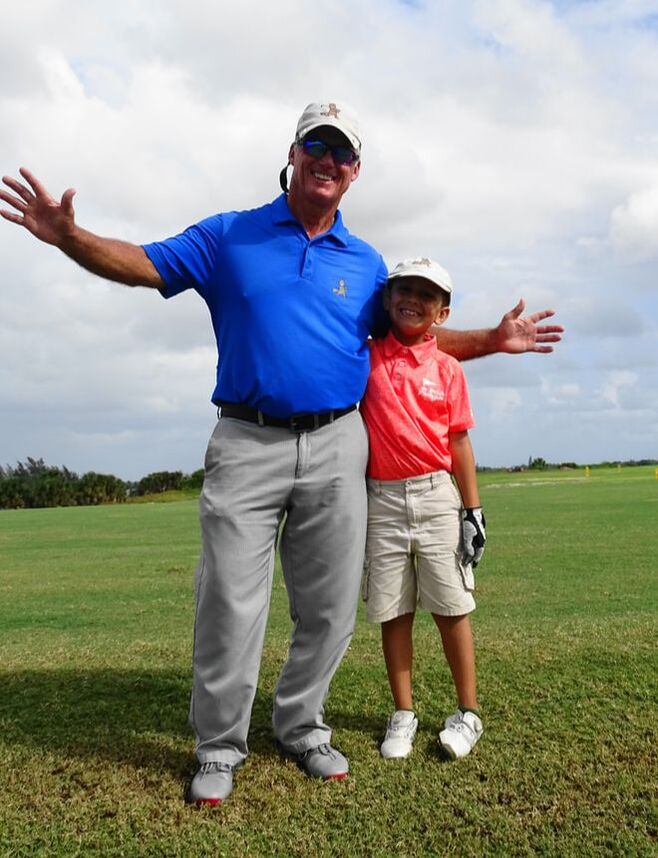 Coach Glen Beaver and student at Park Ridge Golf Course